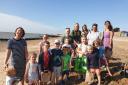 Families join together together to clean Dovercourt beach organised by BWild Adventures