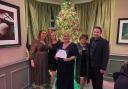 Staff: Impamark Burnham staff with their award