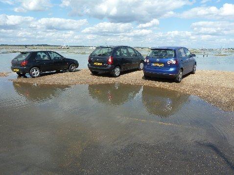 Cars left stranded as the tide comes in at Woodrolfe Creek, Tollesbury, taken by Freddy Brooks.