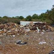A mountain of waste dumped in the Dengie countryside last year