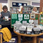 Nicky Martin, Rosemary Thompson, Janette Page and Donna Cooper of Maldon Wycke WI handed green hearts out for an environmental campaign