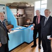 Stow Maries chairman Barry Dickens, vice chair John Aldridge and Phil Robinson unveil new Words Without Wires exhibition