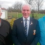 HAPPY: Maldon Winter League winners Ian Ladkin (left) and Lenny Blagden (right) with Maldon club captain Terry Butcher.