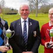 SUCCESS: Winter League winners Pete Hawkins (left) and Martyn Cook (right) receiving the Ben Volta trophies from captain Terry Butcher.