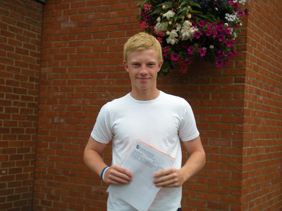 Plume School pupil Chris Harris with his results.