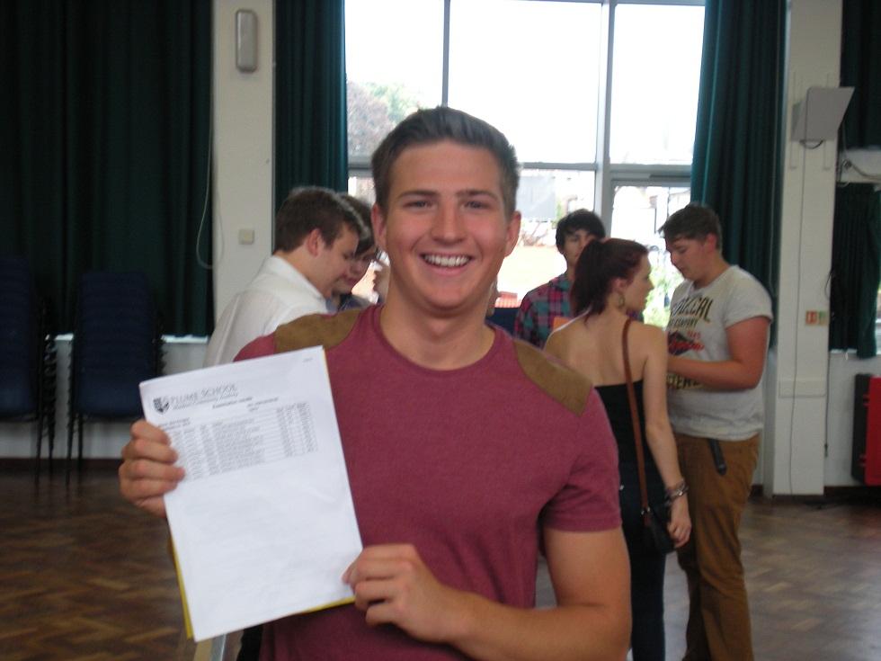 Plume School head boy Ben Knights with his A-level results