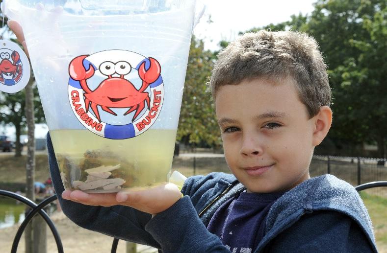 CAUGHT: 
Oliver Barnard, 10, with his bucket of fish and crabs