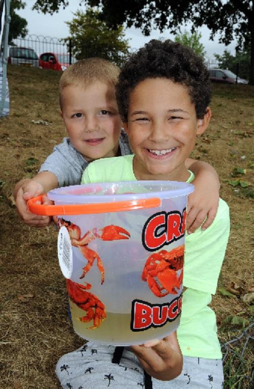 HAPPY: 
Harrison and Reggie Davis with their caught crab in a bucket