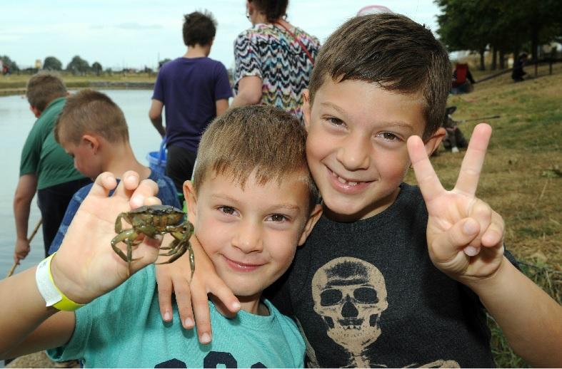 SUCCESS: 
Harvey and Hayden Osborne holding a crab they caught