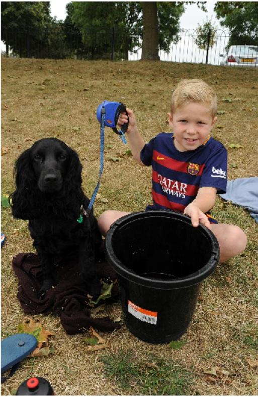 PLEASED: 
Owen Cutmore with his dog Lulu and his bucket with fish and crabs