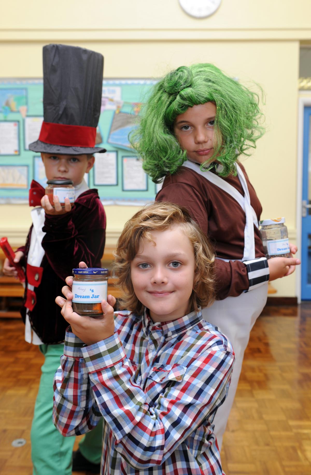 LOOMPA: Ewan Cook as Willy Wonka, Finley Perry-Livings as Charlie and Jessica Harris as an Oompa Loompa from Charlie and the Chocolate Factory