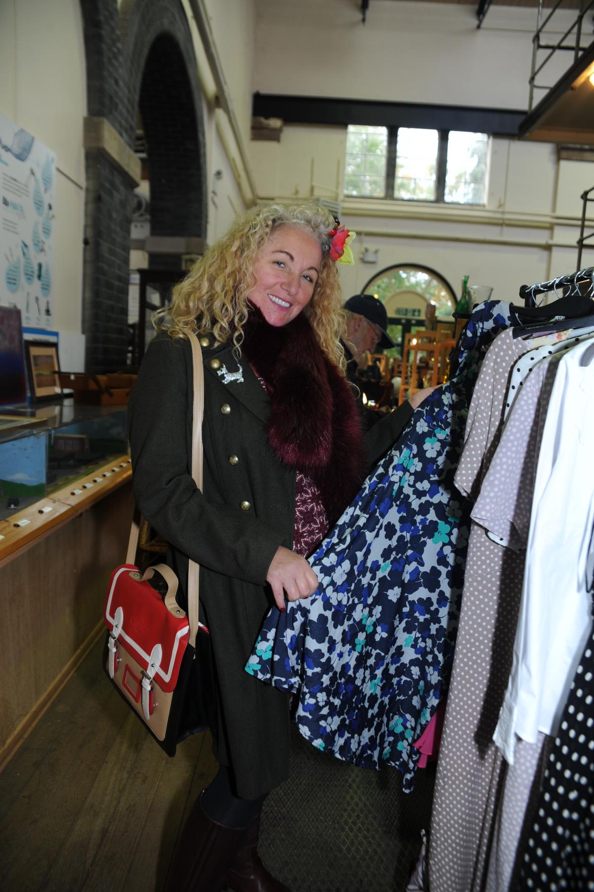 BROWSING: Lindsey Barrell looking at vintage clothing.