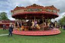 ON THE GALLOPERS: Visitors enjoying the vintage rides at Carters Steam Fair