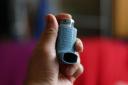 A person holding an Ivax Reliever inhaler for the treatment of asthma, as rising pollen levels this weekend could leave people at risk of life-threatening asthma attacks - Picture by Yui Mok / PA