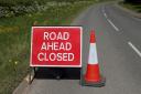 Closure: road ahead closed sign
