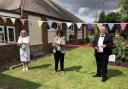 Maldon District Council leader Wendy Stamp, Sandra Swanborough from the Burnham Surgey, and councillor Bob Calver, cut the ribbon to mark the opening of the community garden