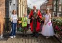 Winner of the competition, Emily Whitworth, with third place winner Charlie Taylor, town mayor David Ogg, and carnival princess Anya Downs