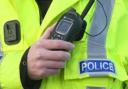 A driver has been arrested and taken to custody on suspicion of three offences
