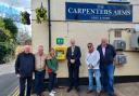 The Carpenters Arms, Maldon Masonic Hall and Maldon Court Preparatory School unveiled the pub's new defibrillator unit with council chairman Mark Heard