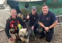 Muddy May posing with her rescuers after the incident (Picture: Essex Fire)
