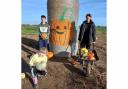Happy customers: enjoying pumpkin picking Picture: Cobbs Farm