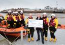 Charity - Will Dallimore is presenting the RNLI’s Senior Helm, Ian Scott with a cheque for £600