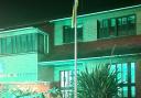 Building: Maldon District Council office lit in green