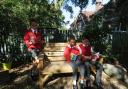 Reading: children from Messing Primary School enjoying the new bench