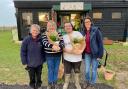 Festive: Perrywood staff spreading Christmas cheer at the Red Rose Community Farm