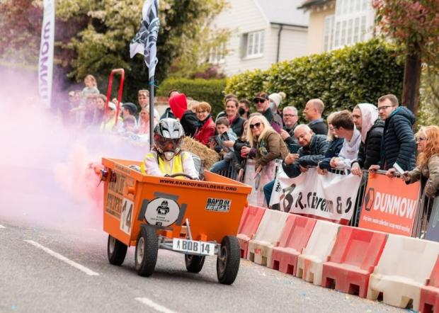Maldon and Burnham Standard: STEAM ROLLING: An orange skip kart speeding through