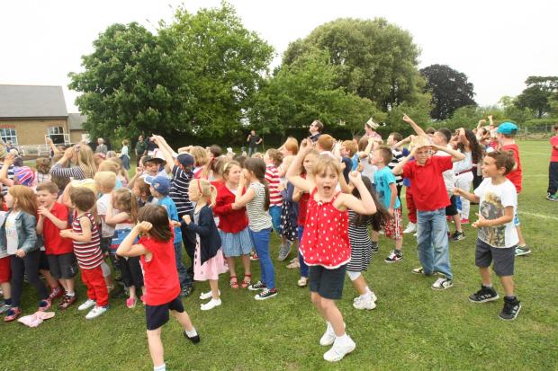 Maldon and Burnham Standard: Rivenhall Primary School jubilee balloon release in the playground