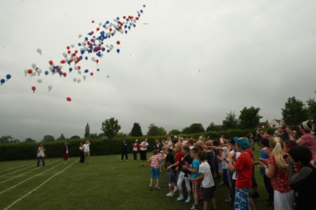 Maldon and Burnham Standard: Rivenhall Primary School jubilee balloon release in the playground