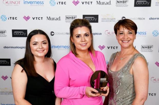 Jessica Bennette and Natalie Wood from The Pink Shed with a representative from sponsors Dermalogica at the Professional Beauty Awards ceremony