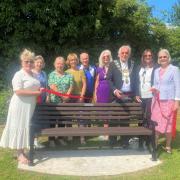 RIBBON CUTTING: The town mayor, mayoress, and members of the Committee gathered to cut the ribbon