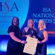 Heathcote Preparatory School and Nursery representatives with the prestigious award