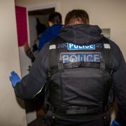Police execute a warrant as part of an investigation into drug supply (Stock image)