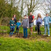 Residents old and young in Tollesbury have planted 400 trees to tackle climate change. Photo: Tollesbury Climate Partnership
