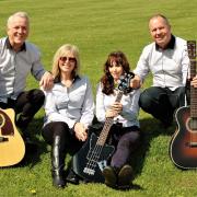 Julian May, Angela Gardner, Beth Pratt and Jon Greaves as The Remedy acoustic band