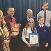 Woodville Primary School, pupils and staff pictured, has been hailed as top in East of England for sustainable travel. Photo: Essex County Council