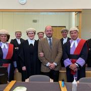 Sarah Przybylska, pictured centre with her farmer husband Paul, sworn in at Ipswich Crown Court
