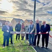 Adrian Fluker cutting the ribbon with John Fisher, David Wilson Homes MD Tom Wright Managin, John Anderson of Southminster Parish Council and Ray Houghton head of planning at David Wilson Homes, and at the back Ben Fisher, Maureen Cooper and June Jolly