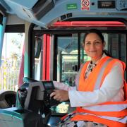 All aboard - Witham MP Dame Priti Patel in the drivers seat during a visit to the Hedingham depot in Kelvedon