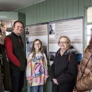 Proud: the Stuart Buttle family and Jeanline Ridly Smith looking at the Wing Commander Ridley panel