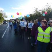 Marching: 200 residents marched along main roads