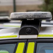 Jailed: top of a police vehicle