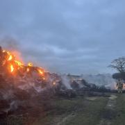 Destroyed - large fire affecting a pile of hay in Maldon