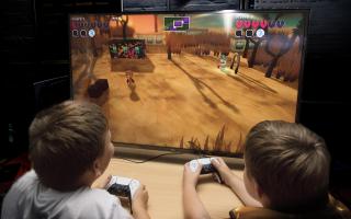 Gaming: children socialising at the scheme