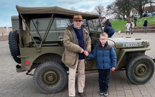 Family - Essex HMVA joint patron Stephen Nunn with grandson Lucas in front of a military vehicle